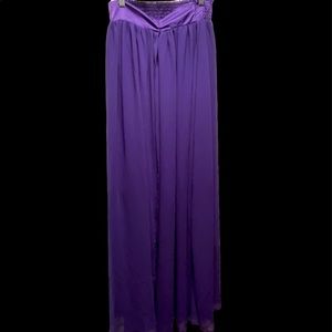Long purple skirt with high slit